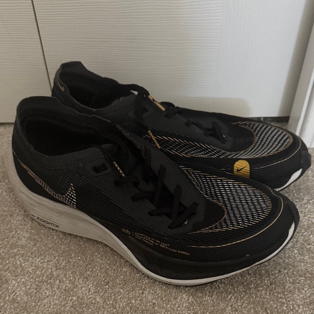 Nike Women’s Black and Gold Running Shoes